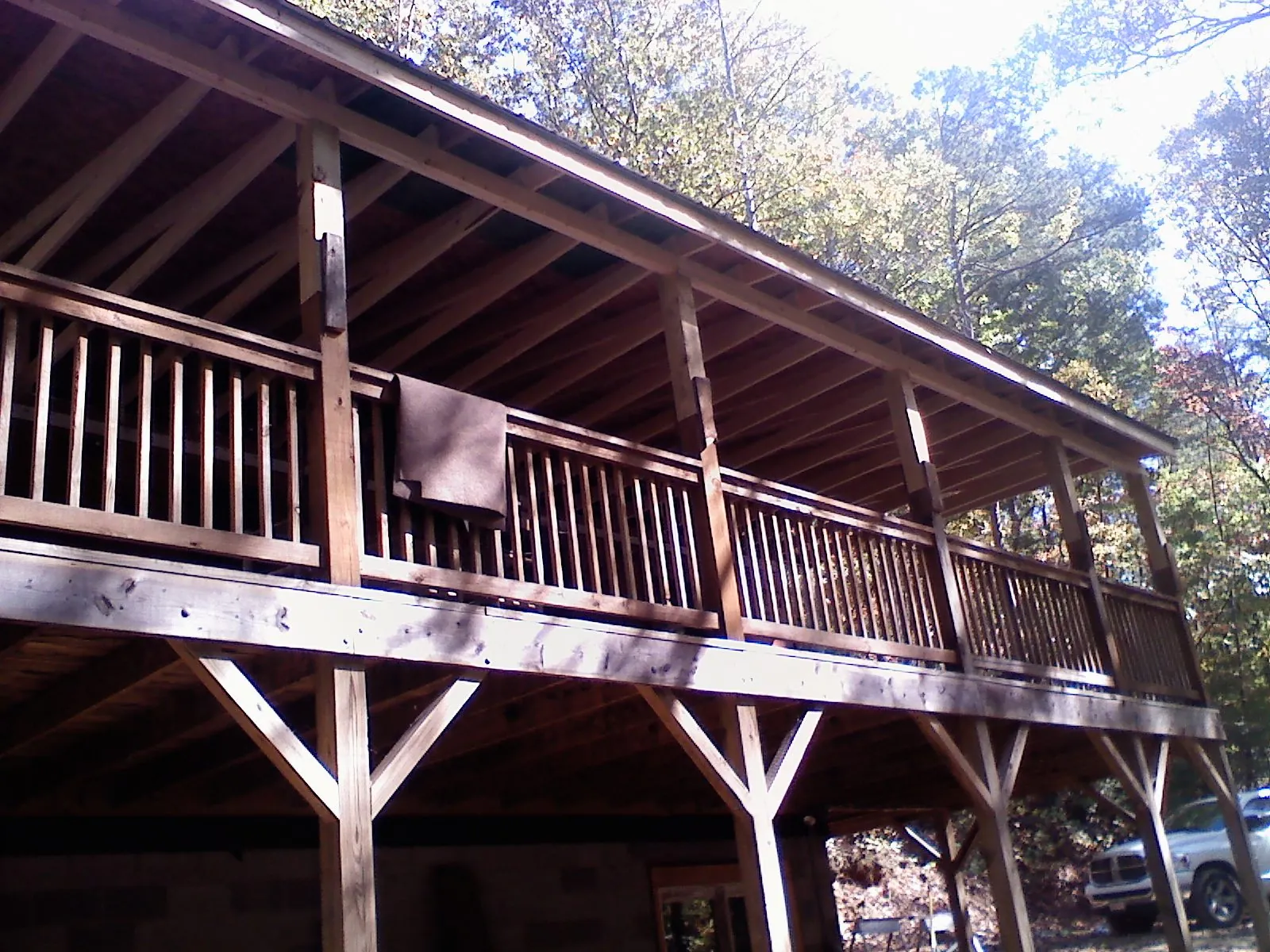 Timber framing under a new elevated porch and deck — Roof Leak Repair in Three Bridges by Roofing Brothers
